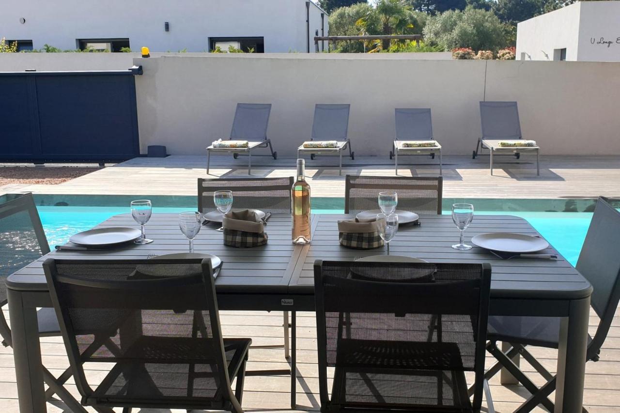 Jolie villa dans résidence avec piscine chauffée privée Lecci Exterior foto