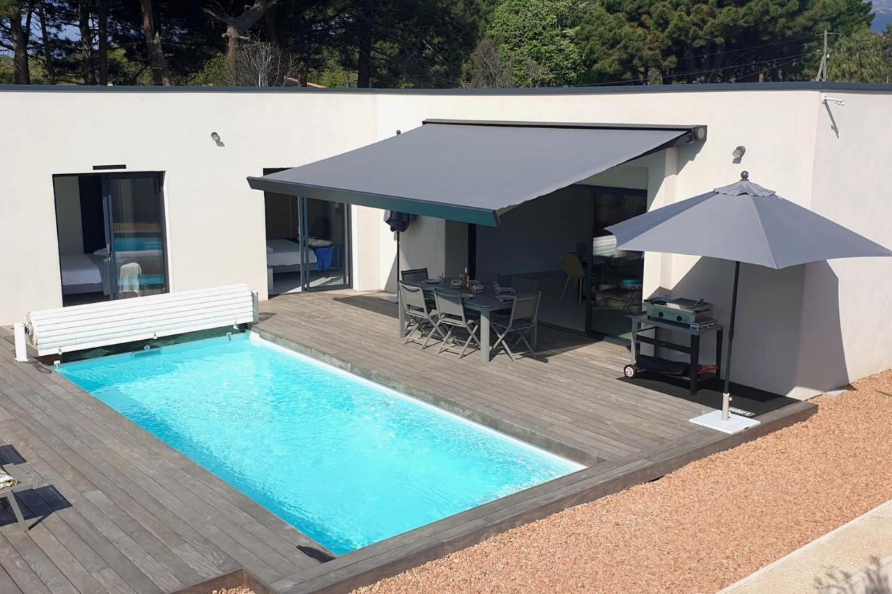 Jolie villa dans résidence avec piscine chauffée privée Lecci Exterior foto